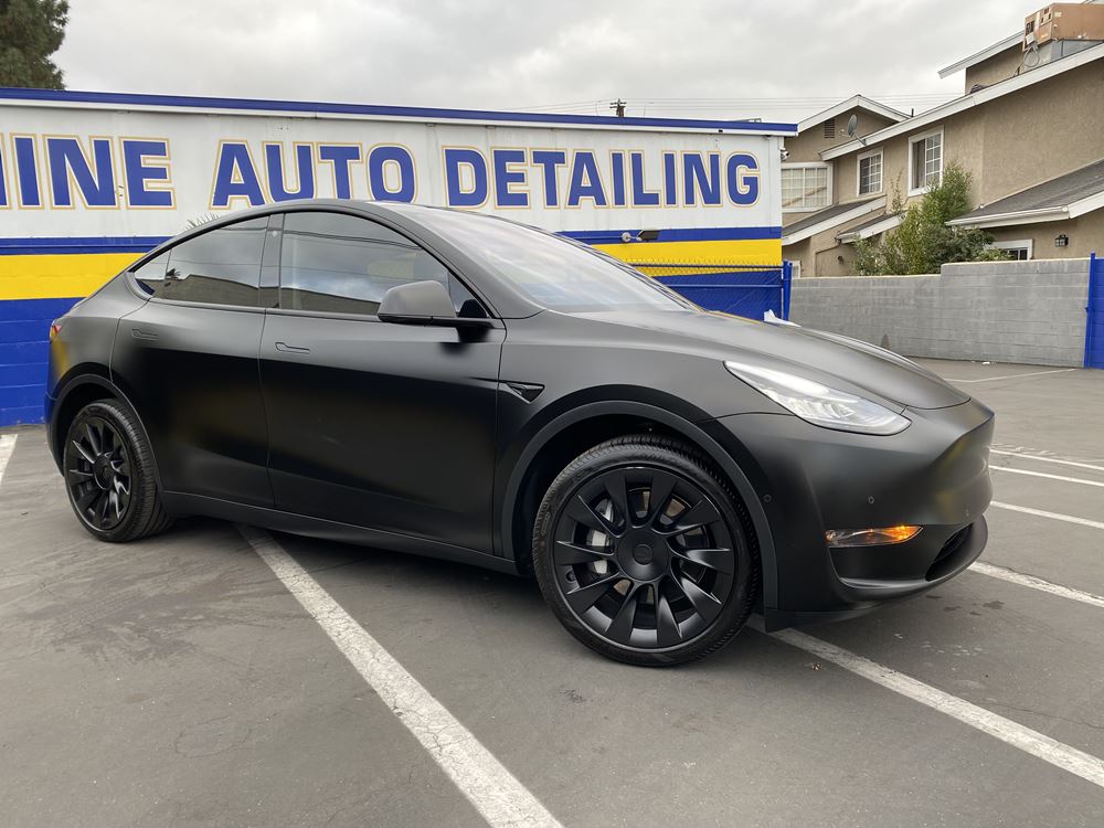 Black Tesla with paint protection film