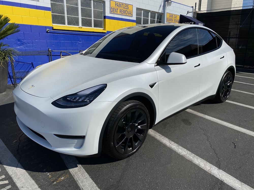 White Tesla with paint protection film
