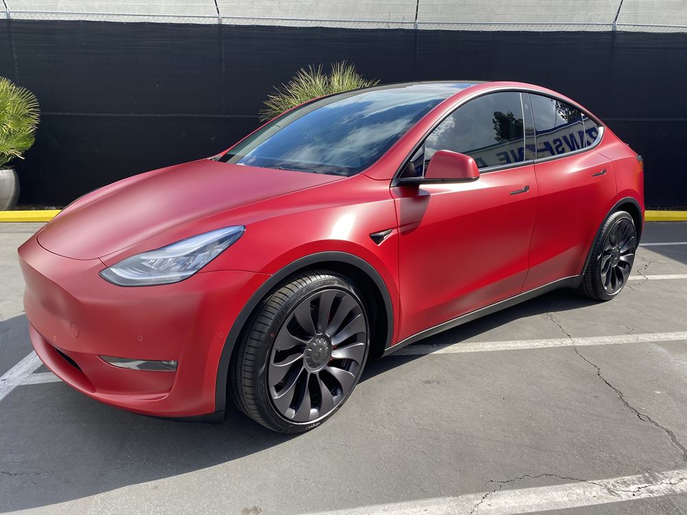 Red Tesla with paint protection film